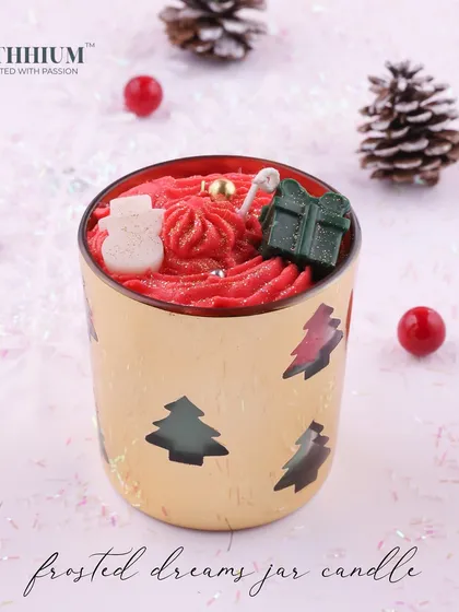This 'Frosted Dreams' jar features Christmas tree cutouts and is topped with a snowman.