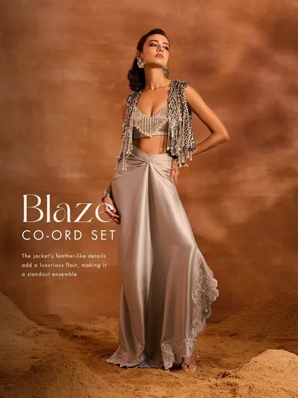 The Blaze Co-ord Set, adorned with hand-embellishments. I paired a tassel-embellished jacket and blouse with a flowing satin draped skirt for a standout, luxurious look.