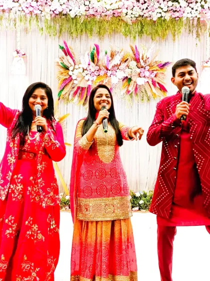 A moment of fun on stage with my co-singers. Our chemistry and energy translate into a great performance for the audience.