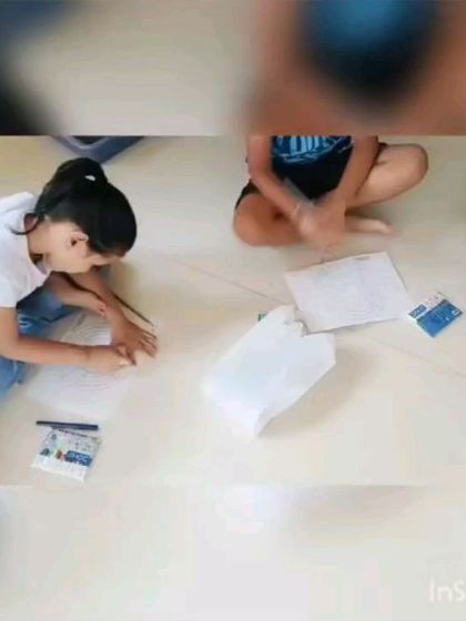 Deep in concentration during a drawing session. We provide all the necessary materials and guidance, allowing children the freedom to express their imagination on paper and develop their artistic skills.