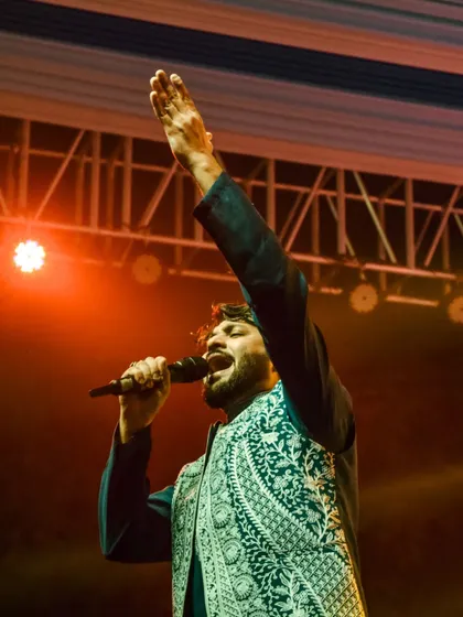 A moment of pure passion on stage, hitting a high note. I give my all in every single performance.