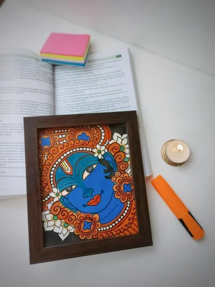I love seeing my art find a home. This small, 9x10 inch framed painting of Narayana is shown here on a study desk, bringing a moment of peace and color to an everyday space. It makes a wonderful personal keepsake.