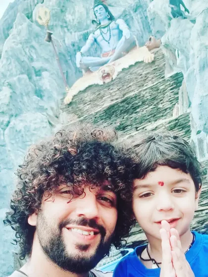 My son joining his hands in prayer. Teaching him the path of devotion inspires me to create musical experiences that are both authentic and accessible for all ages.