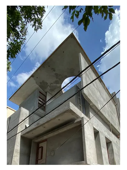 Another perspective of 'Residence 96' during construction, showing the raw concrete structure and the circular oculus in the roof slab, a design element that will create a dramatic play of light.