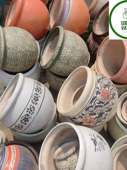 Large, decorative ceramic pots with traditional patterns.