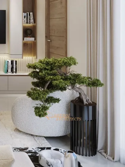 We often use natural elements to ground our designs. This beautifully sculpted bonsai sits in a textured planter, adding an organic and artistic touch to the modern living room corner.