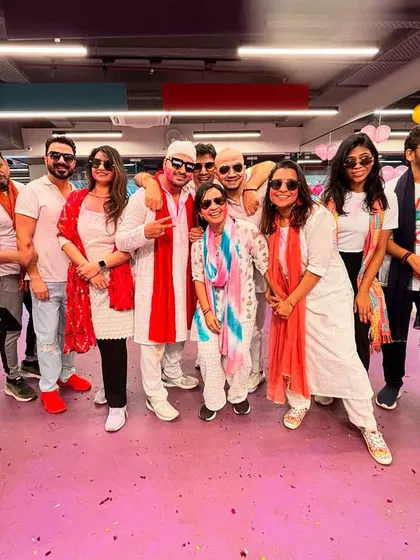 The whole gang together for a Holi group picture. We celebrate every festival like a big family, with lots of swag and masti.