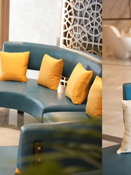 This composition uses a split view to highlight the color and form of the lounge furniture. The vibrant yellow pillows pop against the cool teal sofa, showing my ability to create visually appealing color contrasts in my photography.