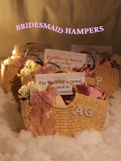 These personalized bridesmaid hampers feature rustic-chic wicker bags, each customized with an initial and filled with goodies. They are perfect for a destination or bohemian-themed wedding.