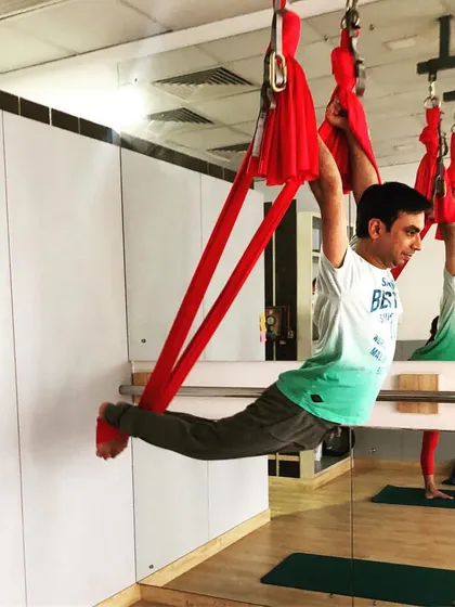This pose is a fantastic core and upper body strengthener. Using the wall for support is a great modification as you build the strength to hold the pose freely.