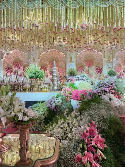 Various angles of the pastel mandap, showcasing the expanse of blooms, the custom seating, the floral aisle, and the intricate details that made this a truly wholesome and majestic celebration.