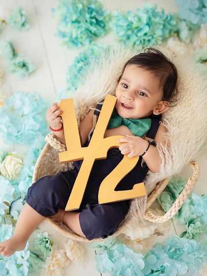 Celebrating a half birthday! This is a wonderful milestone to capture, showing how much your baby has grown in just six months.