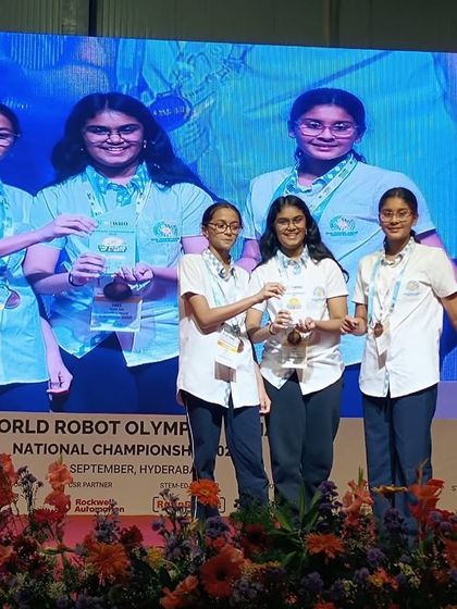 Team ACE, mentored by us, proudly displays their bronze medals at the WRO 2025 Robomission Junior High competition, showcasing their problem-solving skills.