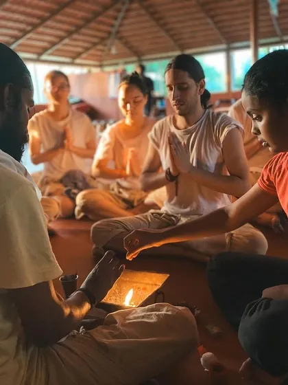 This is a duplicate of image 10 and 230. The fire ceremony is a central and recurring theme, symbolizing the transformative power of our practice.