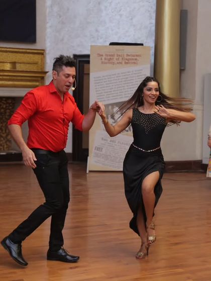 A couple showcases their dance moves at the Grand Ball. The evening featured dazzling ballroom performances, adding a touch of 1950s glamour to the celebration.