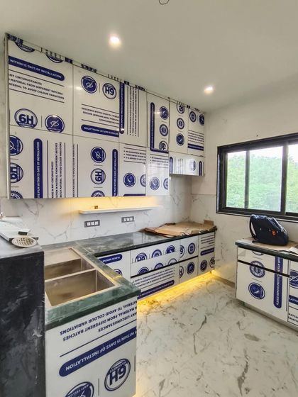 Another angle of the ongoing installation, showing the attention to detail our team puts into every project. The kitchen is already looking bright and spacious.