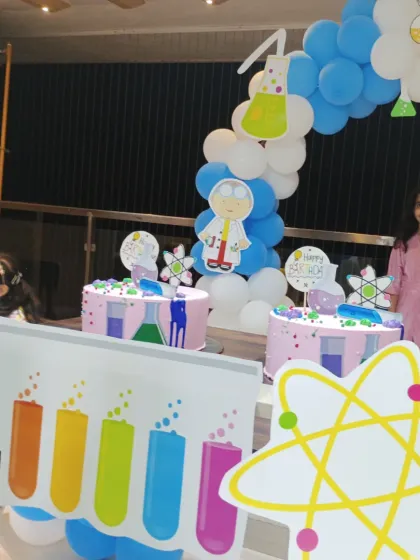 A closer look at the themed cakes and decorations for the science party.