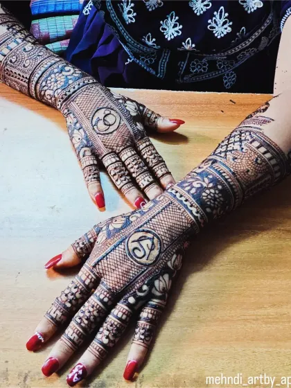 This is an example of an engagement mehendi design. I incorporated the couple's initials, 'S' and 'K', into the center of each hand, creating a beautiful and personal way to celebrate their union.