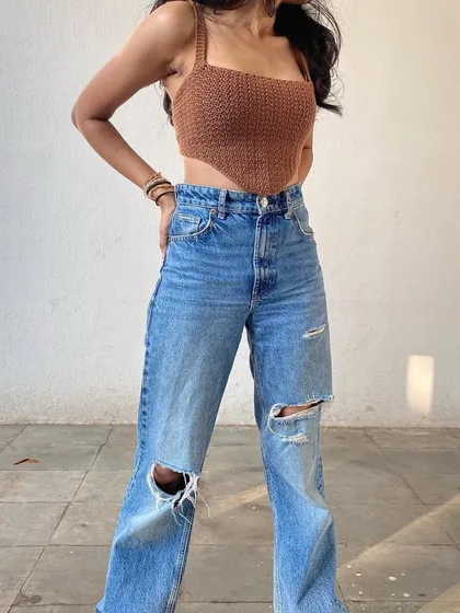Styled with ripped jeans, our handmade corset top creates an effortlessly cool look. Each top is made to your measurements for a perfect, comfortable fit.