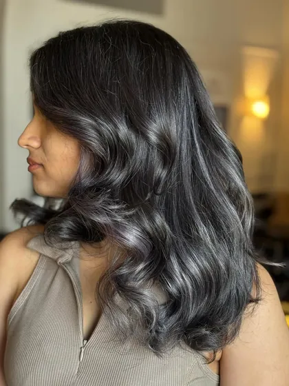 This Ash Lilac color is a unique blend of cool grey and subtle purple tones. It's a modern, edgy look for anyone wanting to try a fashion color that's still sophisticated.