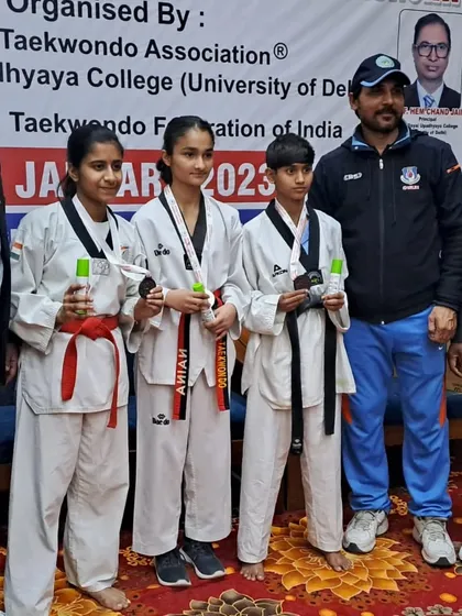 A proud moment with my students after the 38th Delhi State Junior Taekwondo Championship. Naina Joshi's silver medal was a highlight of the event.