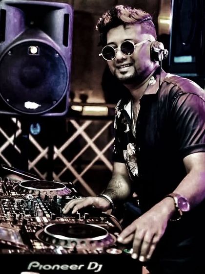 A smiling shot from the DJ booth. Game on.