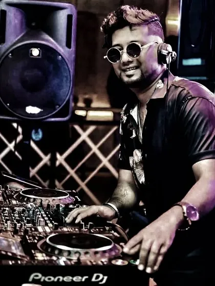 A smiling shot from the DJ booth. Game on.