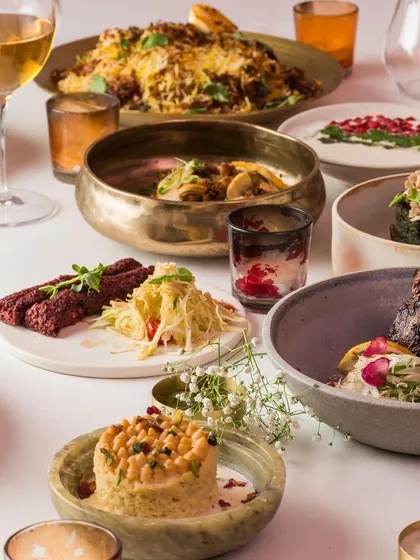 Our culinary range extends to modern interpretations of classic cuisines. This beautifully styled table features dishes from our Modern Indian menu, demonstrating our ability to cater to diverse palates with contemporary flair.
