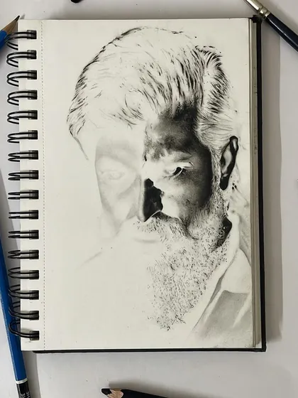 A look at the art midway through the process. This work in progress shows how I build the portrait by sketching with opposite colors, swapping light for shadow. You can see the face beginning to take shape from the reversed tones, a crucial stage in bringing the final image to life.