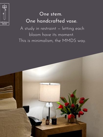 A study in restraint. This minimalist arrangement of red tulips in a simple vase shows that sometimes, less is more. This is minimalism, the MMDS way.