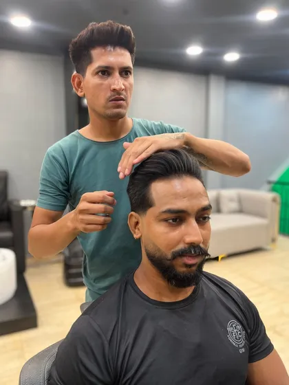 Here I am styling a classic side-part haircut, making sure every hair is in place for a polished finish.