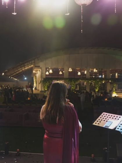 A view from the stage, looking out at a grand wedding celebration. Seeing everyone enjoying the music and celebrating together is the most rewarding part of what we do.