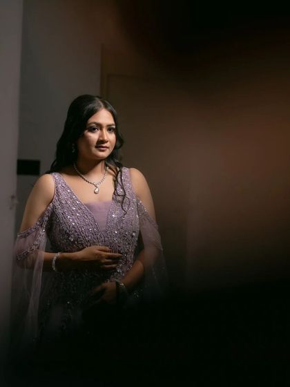 A beautifully lit portrait of the bride, using shadows to create a dramatic and sophisticated look.