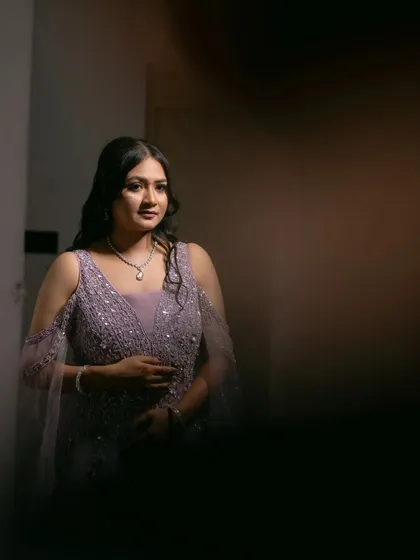 A beautifully lit portrait of the bride, using shadows to create a dramatic and sophisticated look.