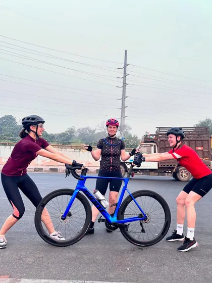 Good times and crazy friends make the best memories. A playful tug-of-war over a bike.