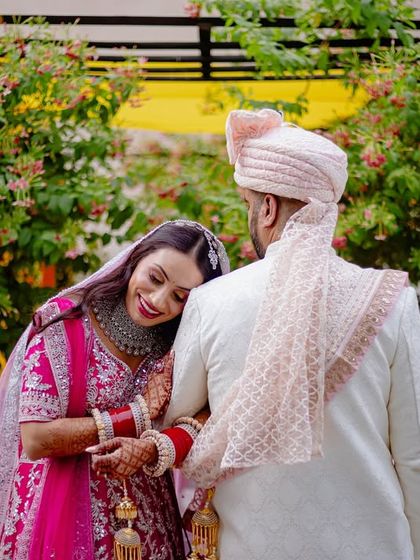 A bride rests her head on her groom's shoulder, a simple gesture of trust and comfort. These are the natural, candid couple portraits I love to create.