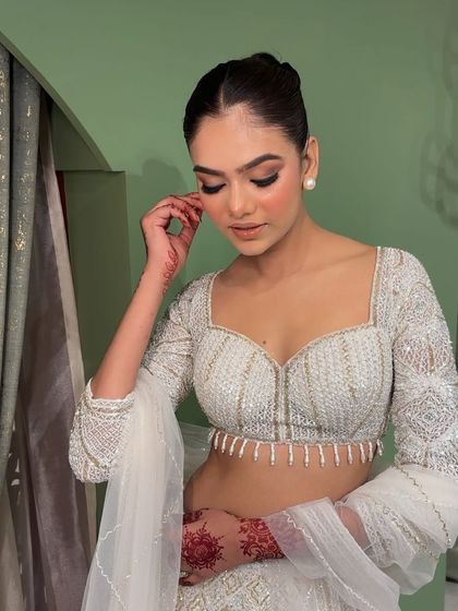 A candid moment showing the soft, blended eyeshadow and radiant skin. This is a versatile look that photographs beautifully.