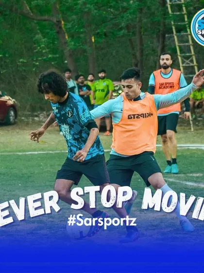 "Never Stop Moving" is our motto. This image captures two players in a dynamic duel for the ball, embodying the constant energy of our games.