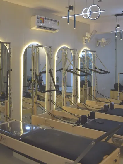 Welcome to our modern, well-lit Pilates studio in Janakpuri. We've created a clean, welcoming, and motivating environment with top-of-the-line Reformer machines so you can focus on your fitness journey.