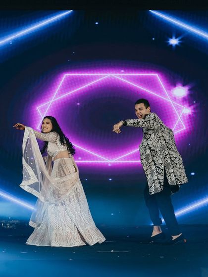 This couple brought the energy with their perfectly coordinated moves. Their sangeet dance was a vibrant and fun performance that lit up the stage.