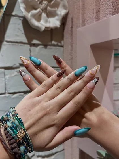 A stunning mixed-media set combining teal and brown tones with textured details and gold accents.