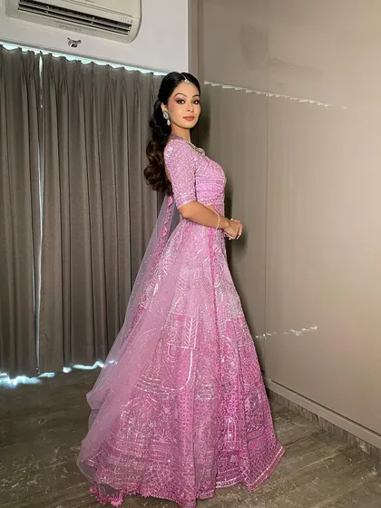 Another shot from our minimal grandeur shoot. The makeup is kept fresh and radiant to complement the unique color of the lehenga.