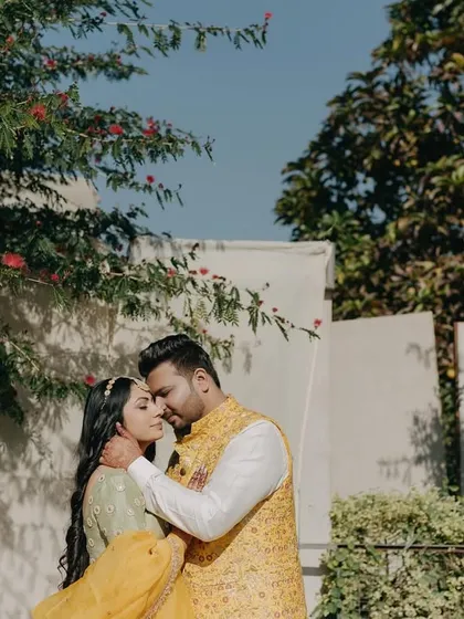 An intimate and tender moment from a wedding anniversary shoot, celebrating a year of love and togetherness.