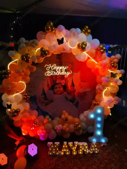 A shot of the princess party decor in the dark to highlight the lights.