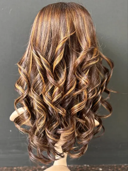 Our creamy blonde custom wig is another stunning option for a glamorous look. The color is rich and the waves are styled for a soft, romantic feel.