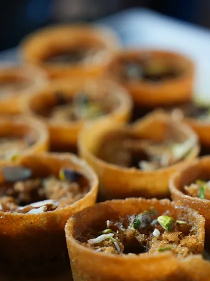 A close up of our Ghevar tarts, a modern, bite sized take on the traditional Rajasthani sweet.