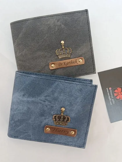 A side-by-side comparison of the personalized denim wallets in both grey and blue color options.