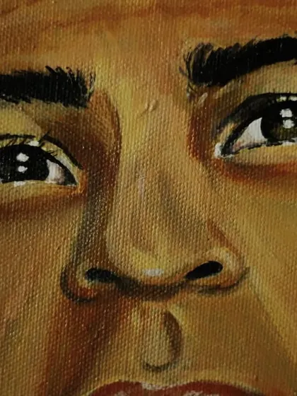 A macro shot focusing on the eyes. For me, capturing the expression in the eyes is the most important part of any portrait.