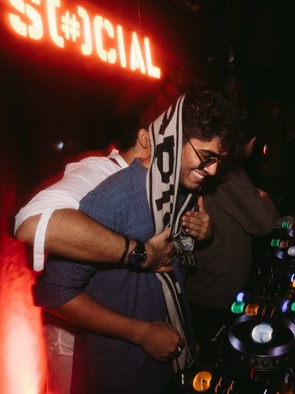 A moment of pure joy and friendship behind the decks. The support from my homies means the world to me.