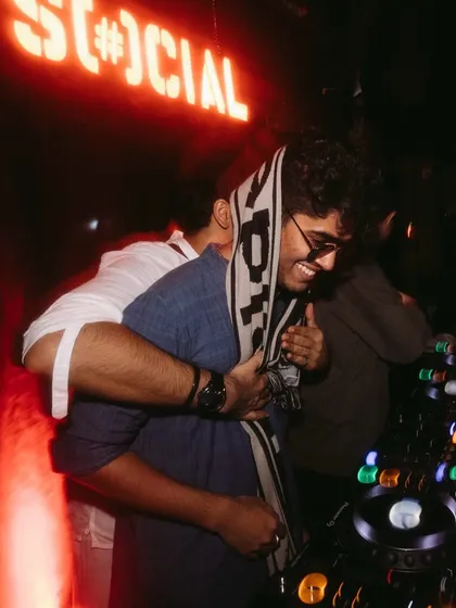 A moment of pure joy and friendship behind the decks. The support from my homies means the world to me.